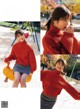 A woman in a red sweater is posing for a magazine.